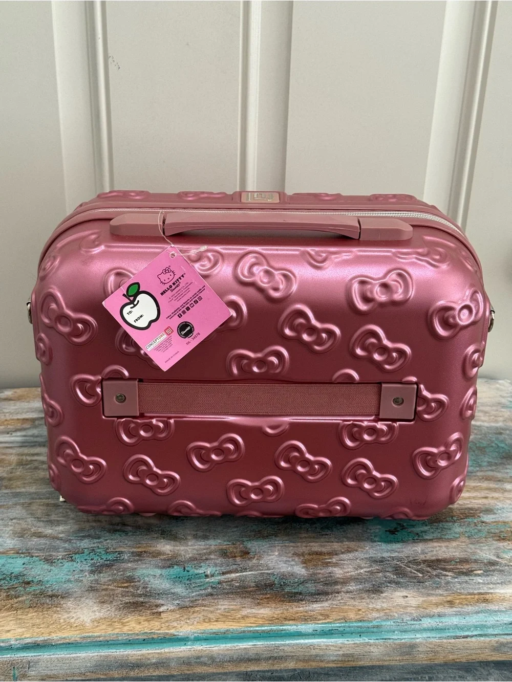 NWT FŪL Hello Kitty 13” Metallic Pink Hardshell Suitcase w/Logo Design